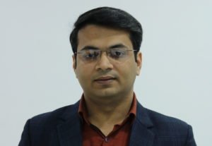 Dr. Puru Dhawan