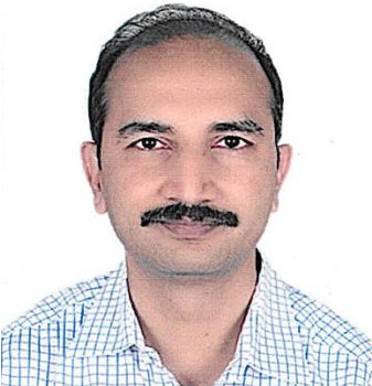 Dr. Manmohan Saini