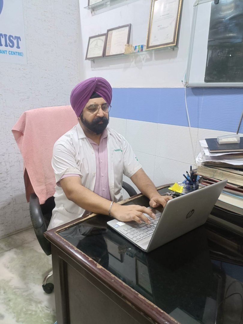 Dr. Yoginder Singh