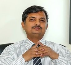 Dr. Arun Baviskar