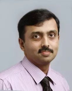 Dr. Arun Warrier