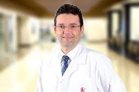 Dr. M. Delikara