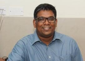 Dr. Naveen Alexander