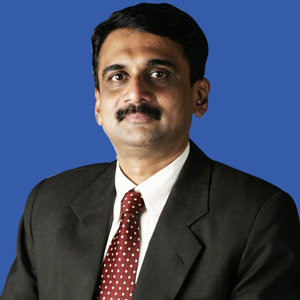 Dr. Tilak Suvarna