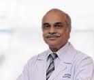 Dr. Kishore S