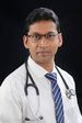 Dr. Magesh B