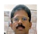 Dr. Rajas Redkar