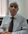 Dr. Kishore Manek