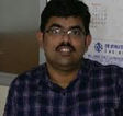 Dr. Arun C