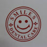 Smiles Dental Care's logo