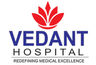 Vedant Hospital's logo