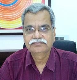 Dr. Mahendra Kamat